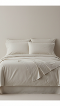 Sleepora Ivory Sand Cotton Sheet Set, front view on neutral background